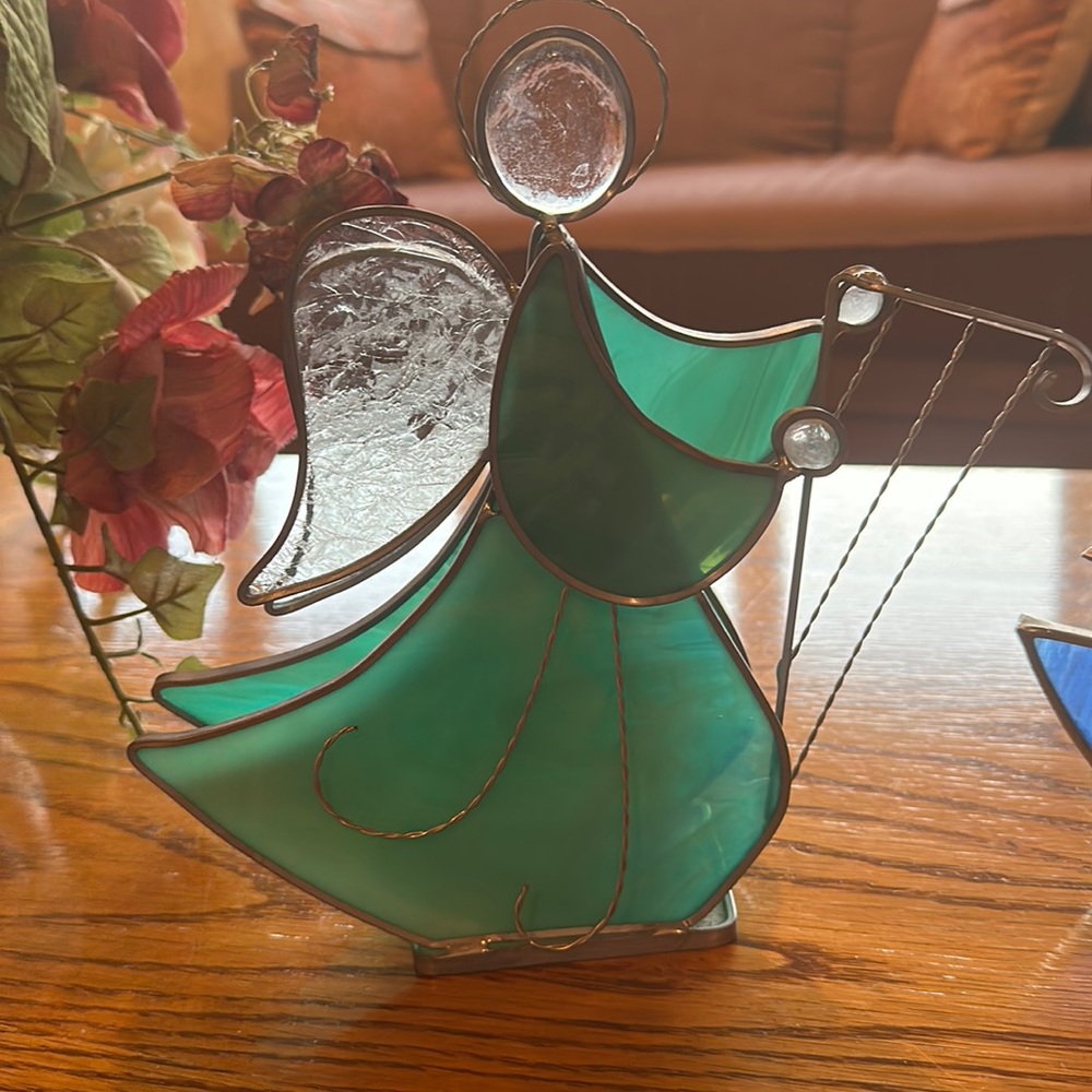 Free standing turquoise stain glass angel with harp.
